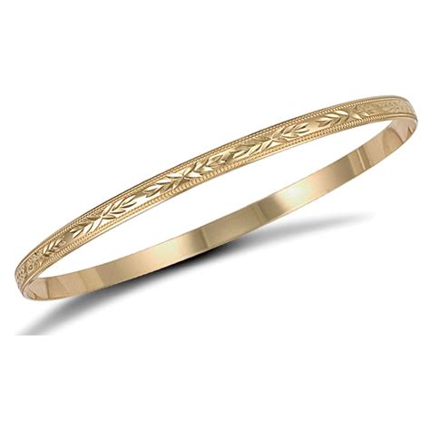 women's solid 9kt gold bangles.